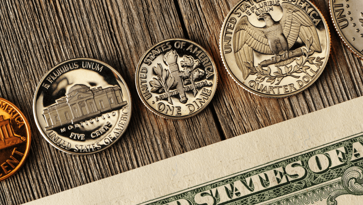 Uncirculated coins on table